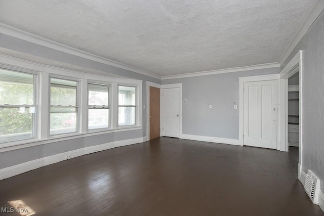 11515 Hopkins Ave, Cleveland, OH 44108 - spare room featuring plenty of natural light, a textured ceiling, dark wood finished floors, and ornamental molding