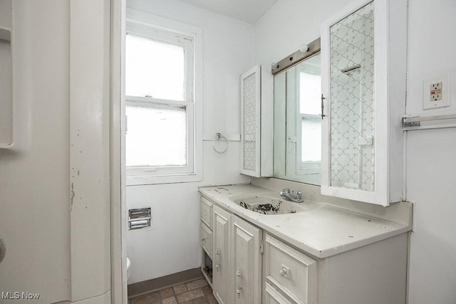 11515 Hopkins Ave, Cleveland, OH 44108 - bathroom featuring healthy amount of natural light and vanity