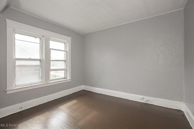 11515 Hopkins Ave, Cleveland, OH 44108 - unfurnished room featuring baseboards and dark wood finished floors