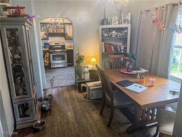 114 S 12th St, Weirton, WV 26062 - dining room with dark wood-style flooring and a chandelier