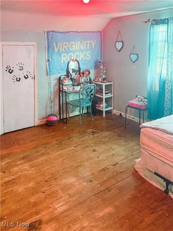 114 S 12th St, Weirton, WV 26062 - bedroom with hardwood / wood-style floors and vaulted ceiling