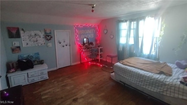 114 S 12th St, Weirton, WV 26062 - bedroom featuring wood finished floors and lofted ceiling