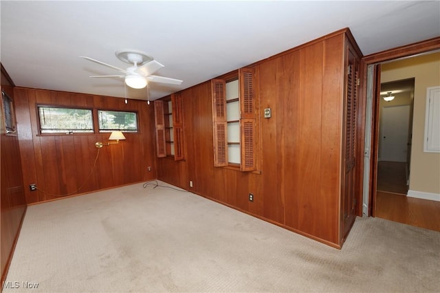 3901 Beaumont Dr, Weirton, WV 26062 - carpeted empty room with ceiling fan and wooden walls