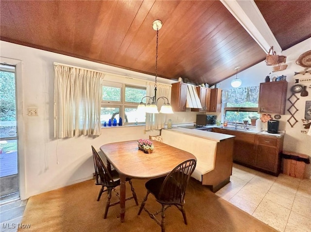 186 Bennett Blvd, Wintersville, OH 43953 - dining space with wooden ceiling, a chandelier, and light tile patterned floors