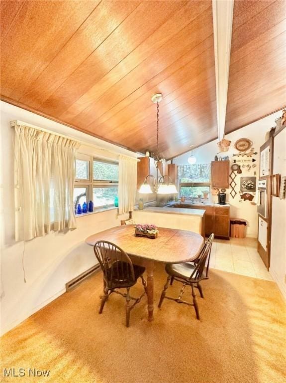 186 Bennett Blvd, Wintersville, OH 43953 - dining space featuring wood ceiling, light carpet, light tile patterned floors, a chandelier, and a baseboard heating unit