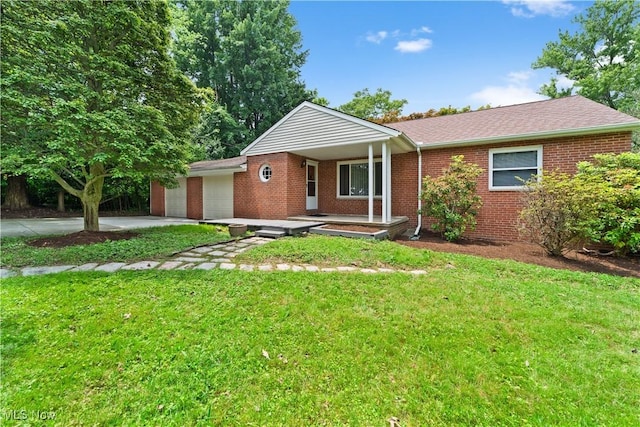 792 Miner Rd, Highland Heights, OH 44143 - ranch-style house featuring driveway, a garage, brick siding, and a front lawn