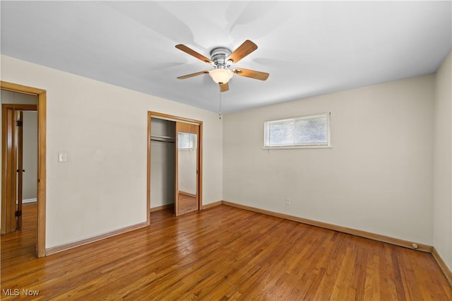 792 Miner Rd, Highland Heights, OH 44143 - unfurnished bedroom with a closet, light wood-style flooring, and a ceiling fan