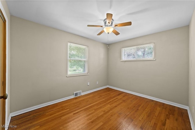 792 Miner Rd, Highland Heights, OH 44143 - unfurnished room featuring healthy amount of natural light, wood finished floors, and ceiling fan