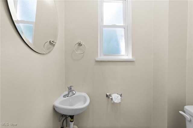 792 Miner Rd, Highland Heights, OH 44143 - half bathroom with toilet and a sink