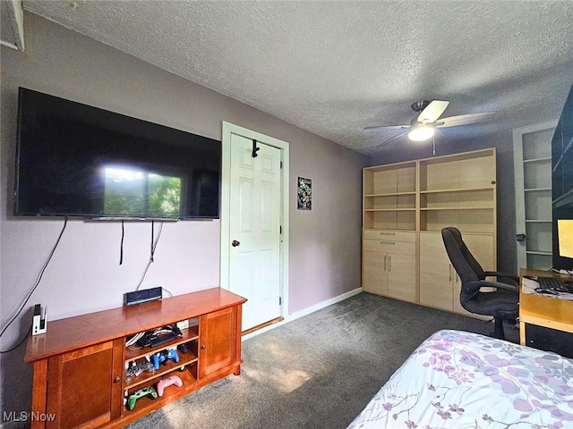 8240 Bellflower Rd, Mentor, OH 44060 - bedroom featuring a desk, carpet floors, a textured ceiling, and ceiling fan