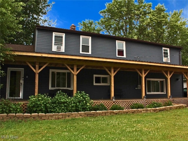 8240 Bellflower Rd, Mentor, OH 44060 - farmhouse inspired home with a front yard and a chimney