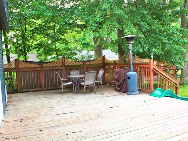 8240 Bellflower Rd, Mentor, OH 44060 - deck with outdoor dining area