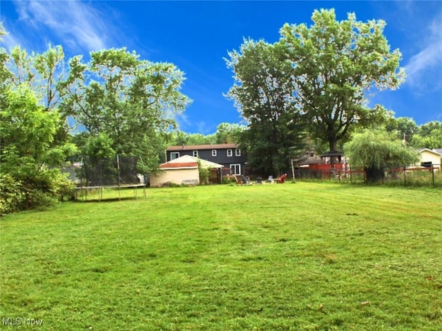8240 Bellflower Rd, Mentor, OH 44060 - view of yard with a trampoline