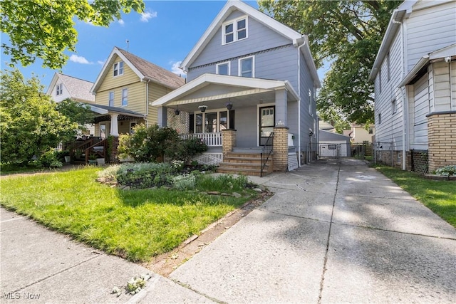 3400 W 118th St, Cleveland, OH 44111 - traditional style home with a porch and a garage