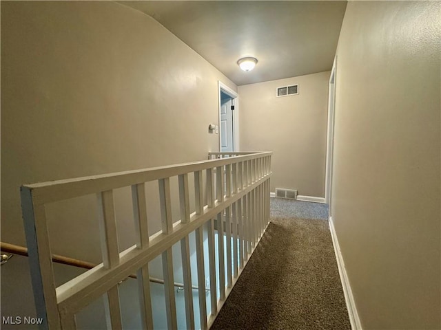 2420 Empire Rd NE, Canton, OH 44705 - corridor with carpet flooring and an upstairs landing