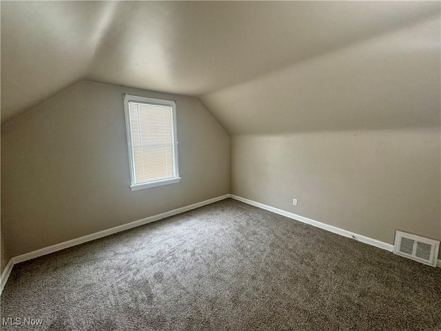 2420 Empire Rd NE, Canton, OH 44705 - additional living space featuring carpet floors and lofted ceiling