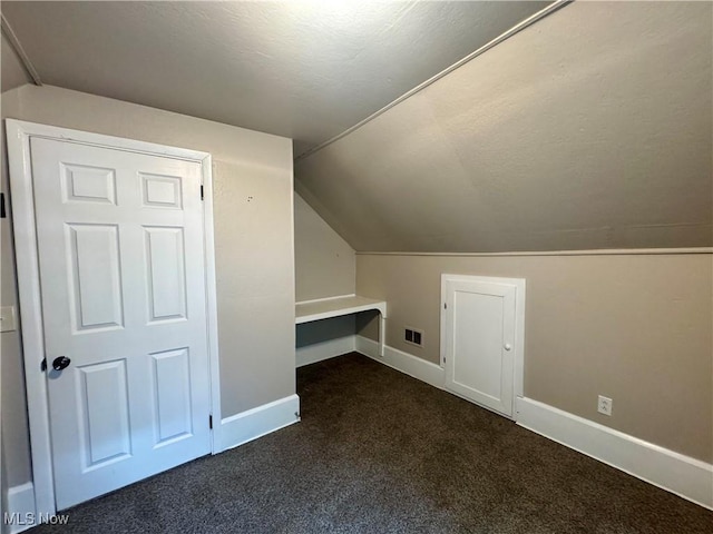 2420 Empire Rd NE, Canton, OH 44705 - bonus room with vaulted ceiling and carpet floors
