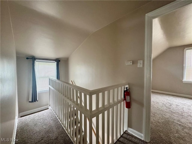 2420 Empire Rd NE, Canton, OH 44705 - staircase with carpet floors, vaulted ceiling, and plenty of natural light
