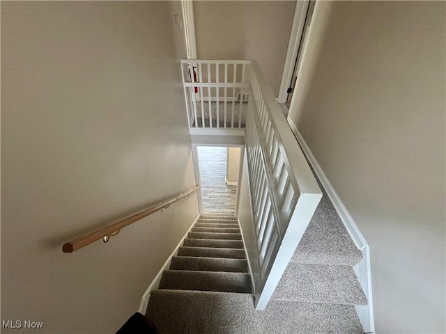 2420 Empire Rd NE, Canton, OH 44705 - stairway featuring baseboards