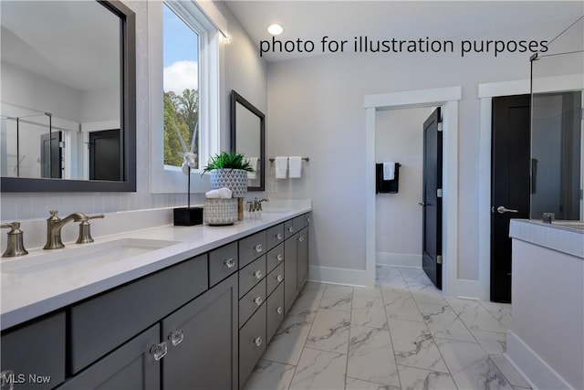 52 Boulder Blvd, Peninsula, OH 44264 - bathroom featuring double vanity, marble finish flooring, and recessed lighting