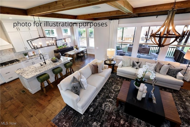 52 Boulder Blvd, Peninsula, OH 44264 - living area with a chandelier, dark wood-style floors, and beamed ceiling