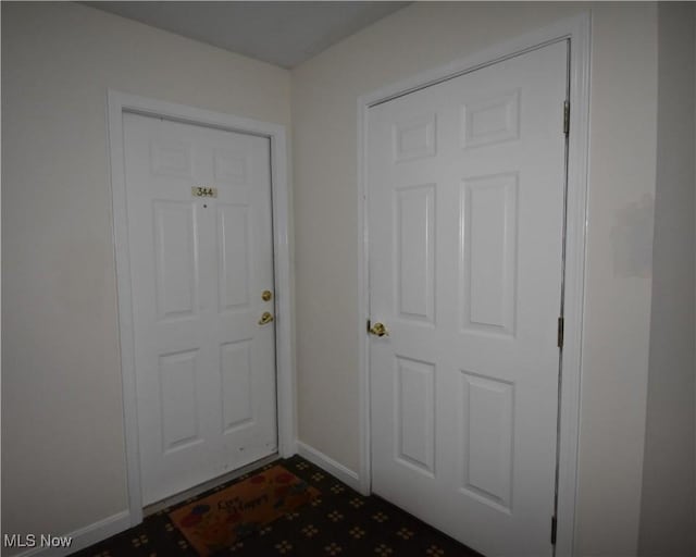 23004 Chandlers Ln Unit 4-344, Olmsted Falls, OH 44138 - doorway to outside featuring baseboards