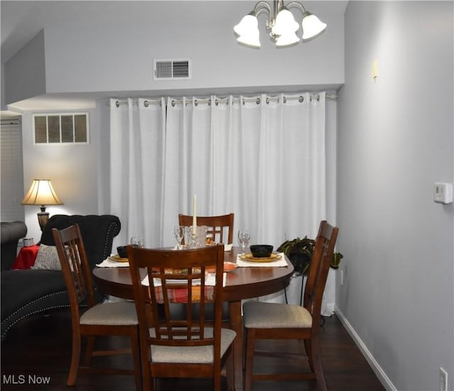 23004 Chandlers Ln Unit 4-344, Olmsted Falls, OH 44138 - dining area with a chandelier and dark wood-type flooring