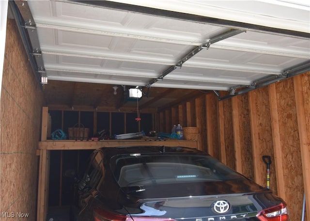 23004 Chandlers Ln Unit 4-344, Olmsted Falls, OH 44138 - garage with a garage door opener