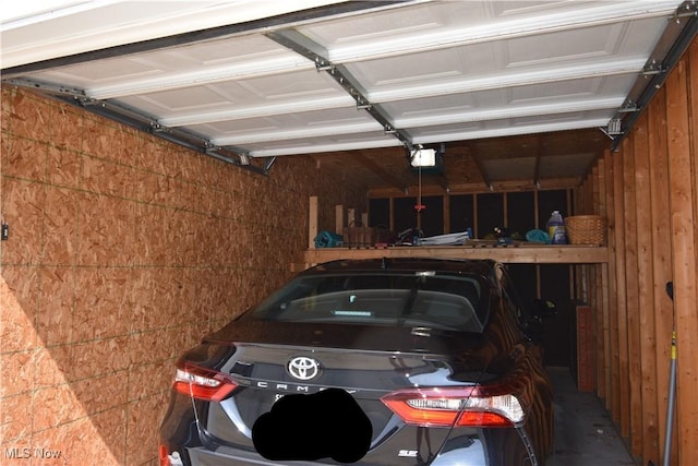 23004 Chandlers Ln Unit 4-344, Olmsted Falls, OH 44138 - garage featuring a garage door opener