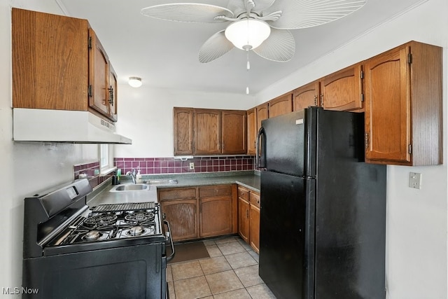 2557 Ogden Ave, Akron, OH 44312 - kitchen with black appliances and brown cabinetry