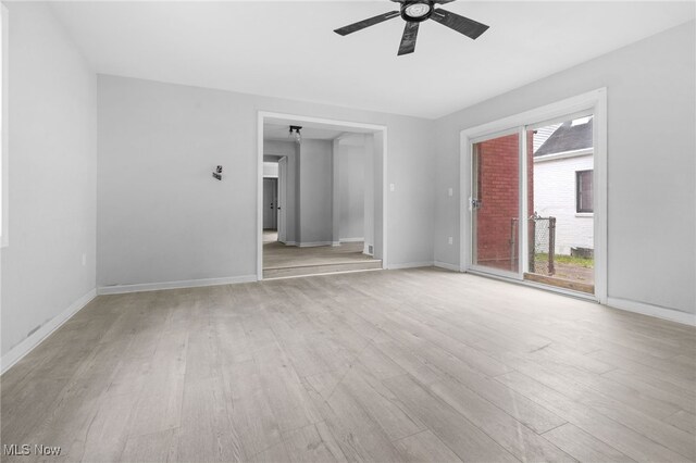 922 Winton Ave, Akron, OH 44320 - unfurnished room featuring ceiling fan and wood finished floors