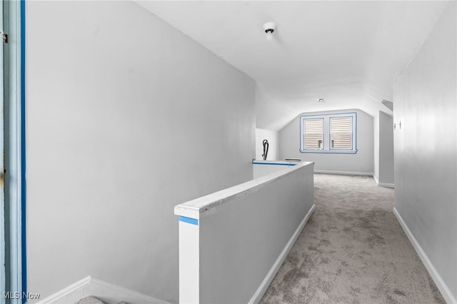 922 Winton Ave, Akron, OH 44320 - hall with carpet, an upstairs landing, and vaulted ceiling