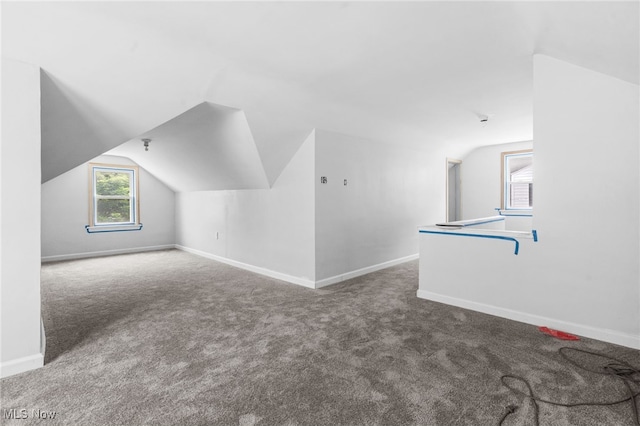 922 Winton Ave, Akron, OH 44320 - additional living space with lofted ceiling and carpet