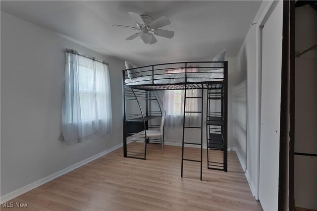 374 Glendola Ave NW, Warren, OH 44483 - unfurnished bedroom featuring light wood finished floors