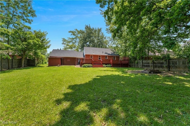374 Glendola Ave NW, Warren, OH 44483 - fenced backyard with a wooden deck