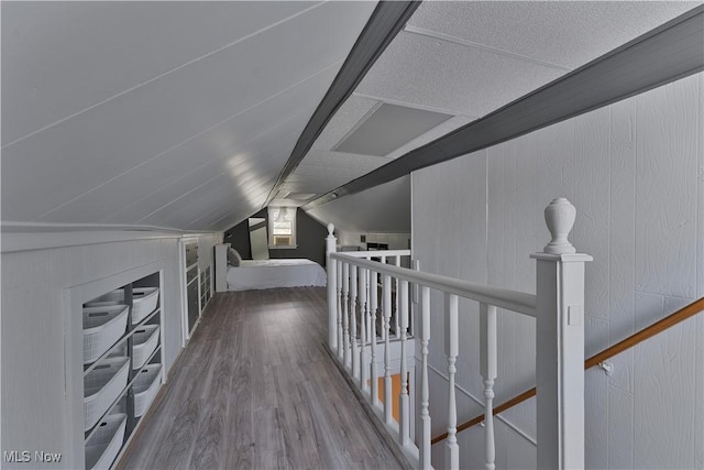 374 Glendola Ave NW, Warren, OH 44483 - additional living space featuring wood finished floors and vaulted ceiling
