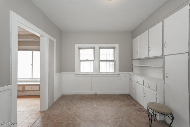 3569 E 154th St, Cleveland, OH 44120 - unfurnished dining area featuring wainscoting