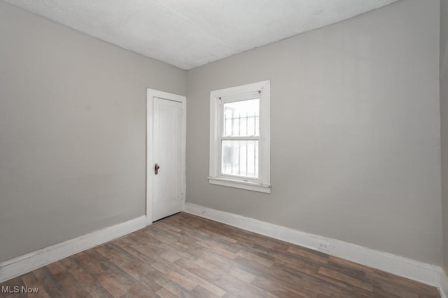 3569 E 154th St, Cleveland, OH 44120 - unfurnished room featuring wood finished floors