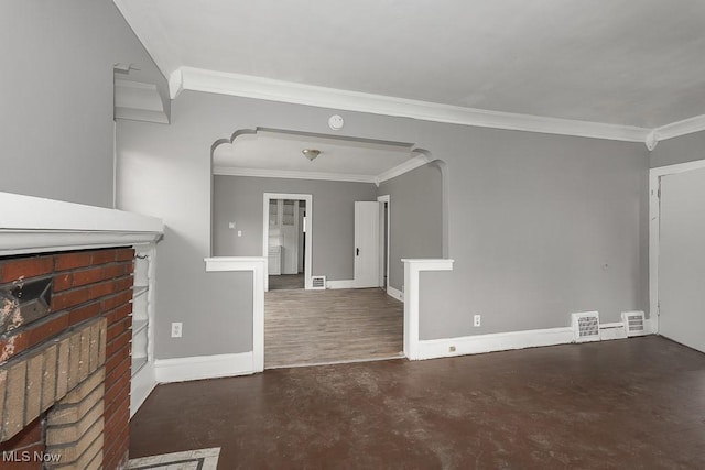3569 E 154th St, Cleveland, OH 44120 - unfurnished living room with a fireplace, crown molding, arched walkways, and finished concrete flooring