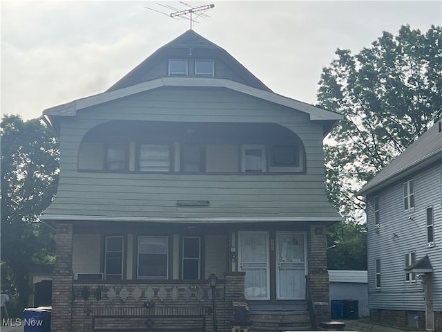 3569 E 154th St, Cleveland, OH 44120 - view of front of home with a porch