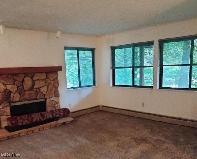 2197 Pinebrook Trl, Cuyahoga Falls, OH 44223 - unfurnished living room featuring carpet, healthy amount of natural light, and a fireplace