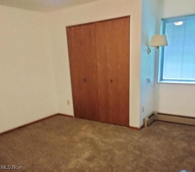 2197 Pinebrook Trl, Cuyahoga Falls, OH 44223 - unfurnished bedroom with carpet flooring, a baseboard radiator, and a closet
