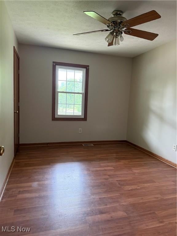 2359 Schellin Rd, Wooster, OH 44691 - spare room with wood finished floors and a ceiling fan