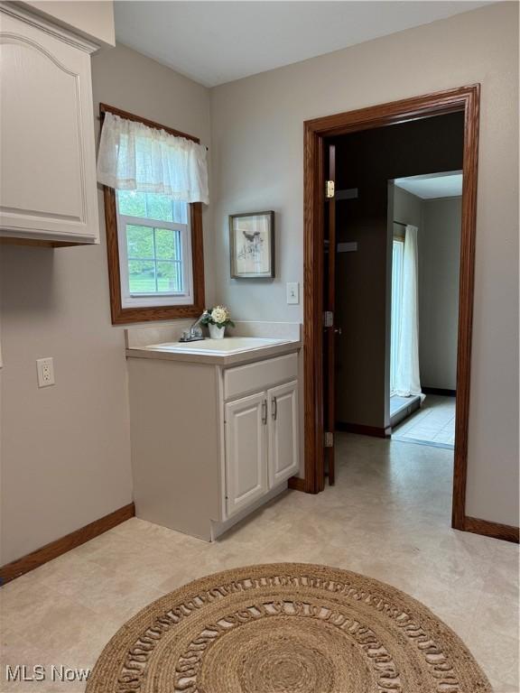 2359 Schellin Rd, Wooster, OH 44691 - bathroom featuring baseboards and vanity