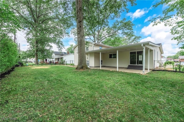 5417 Edgewood Dr, Lorain, OH 44053 - rear view of property featuring a patio and a fenced backyard