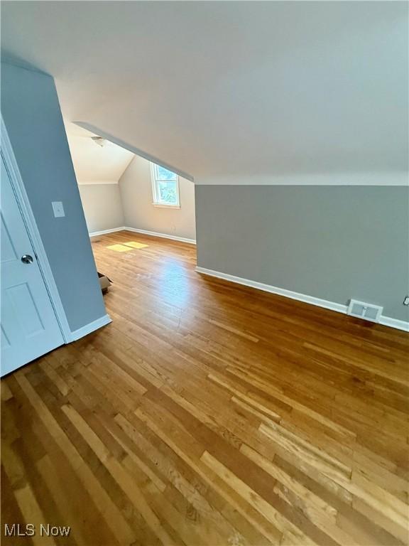 450 E 255th St, Euclid, OH 44132 - bonus room featuring vaulted ceiling and hardwood / wood-style floors