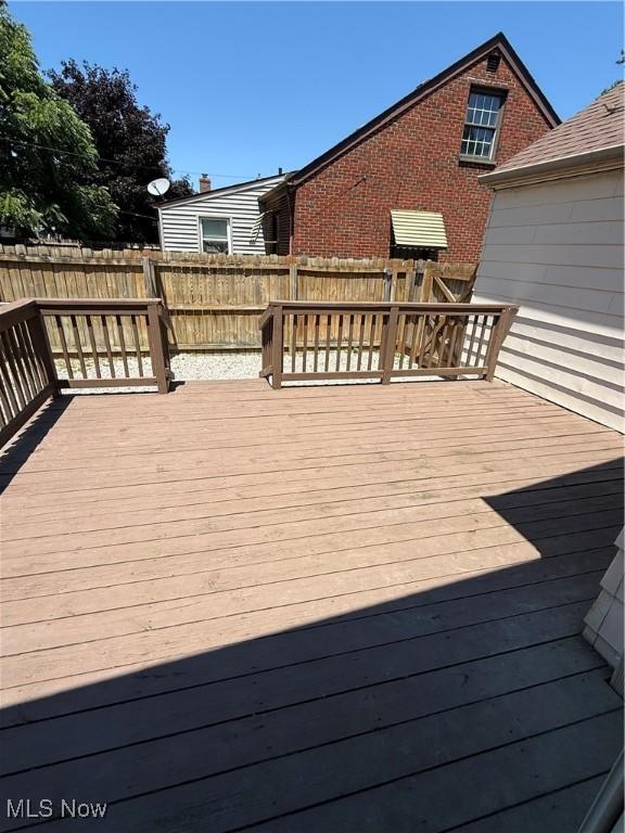 450 E 255th St, Euclid, OH 44132 - wooden terrace with a fenced backyard