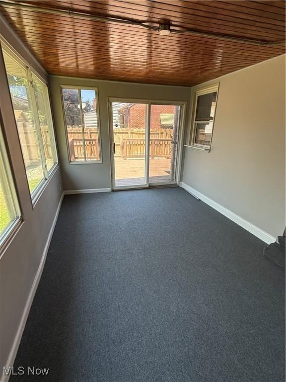 450 E 255th St, Euclid, OH 44132 - unfurnished sunroom featuring wood ceiling, healthy amount of natural light, and carpet
