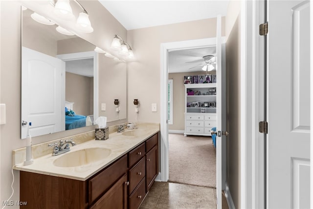 3202 S Lipkey Rd, North Jackson, OH 44451 - bathroom with ceiling fan, double vanity, connected bathroom, and tile patterned flooring