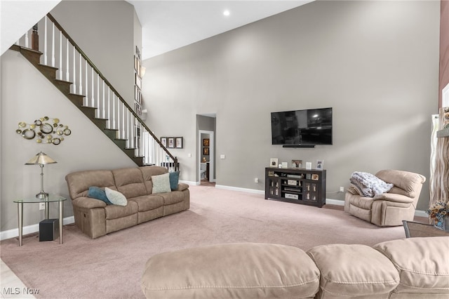 3202 S Lipkey Rd, North Jackson, OH 44451 - living room with a high ceiling, carpet, and stairs